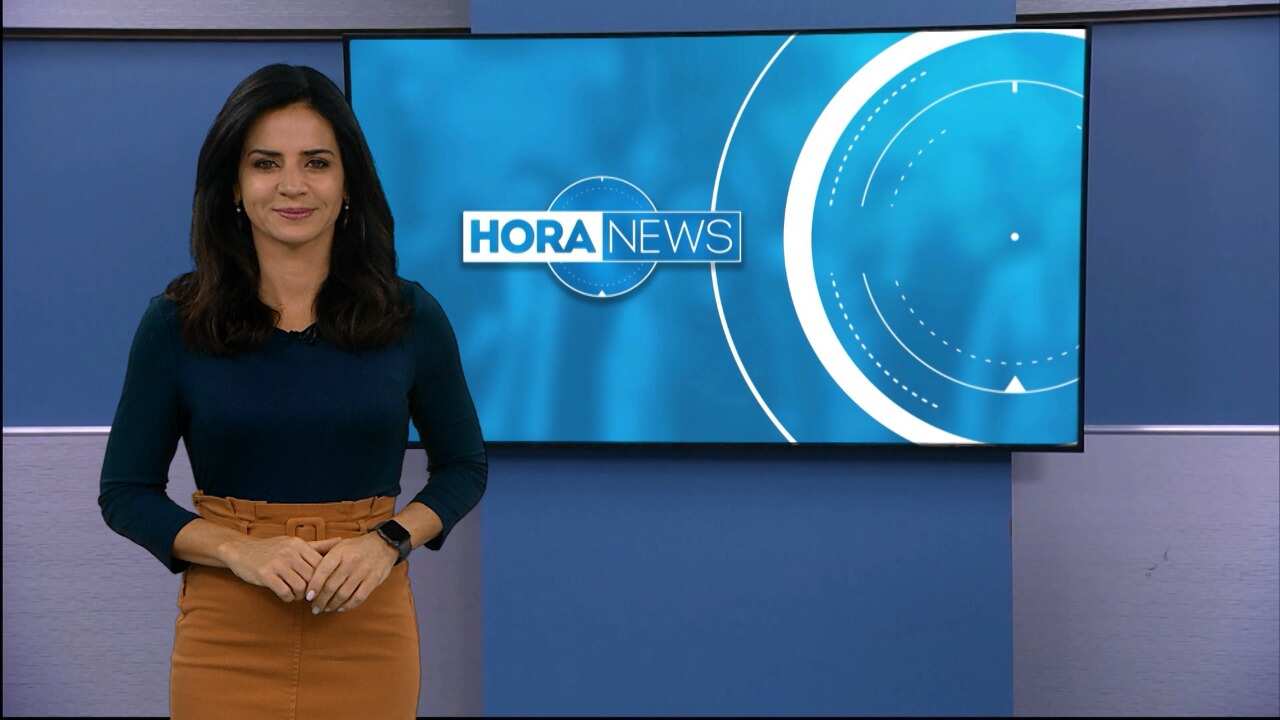 Kelly Godoy apresentando o Hora News