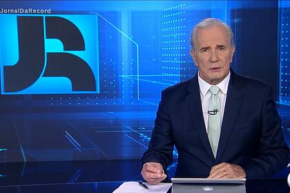 Celso Freitas na bancada do Jornal da Record