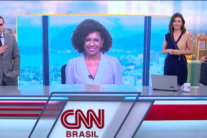 Rafael colombo, elisa veeck e stephanie alves nos estúdios do cnn novo dia, com luciano barreto do telão