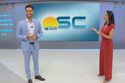 Eveline poncio apresenta douglas márcio no novo cenário do bom dia sc