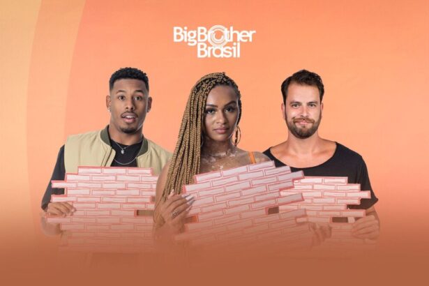 Paulo André, Natália e Gustavo segurando um paredão na imagem.