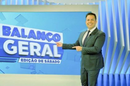 Matheus Furlan no estúdios do Balanço Geral de SP, em frente ao telão