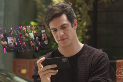 Mateus solano (guilherme) mexendo em um celular, em trecho da novela quanto mais vida, melhor!
