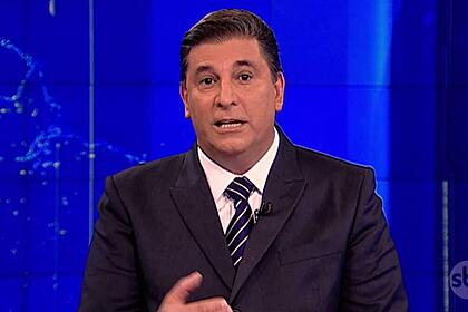 Carlos Nascimento na bancada do SBT Brasil