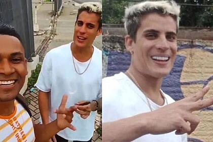 Tiago sorrindo ao lado de um homem.