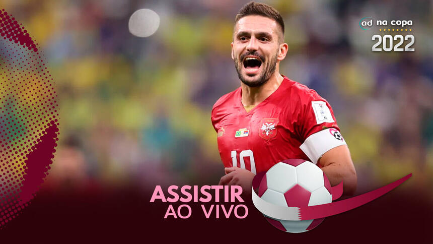 Jogador Dusan Tadic, com a camisa de Sérvia, na arte onde assistir ao jogo Camarões x Sérvia