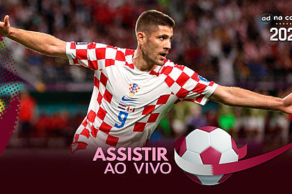 Jogador Kramaric, com a camisa da Croácia, na arte de onde assistir ao jogo Croácia x Bélgica
