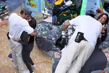 Cara de Sapato e Dania Mendez dando selinho e deitados na cama do quarto fundo do mar no BBB 23