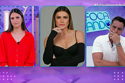 Cris flores de vermelho e leo dias com a mão na boca entrevistando mirella no fofocalizando do sbt