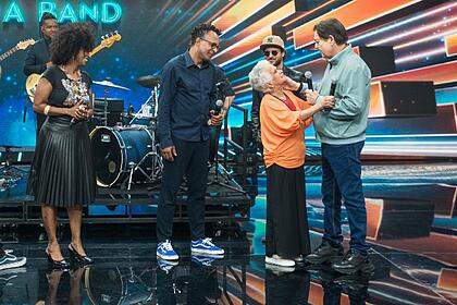 Faustão recebe Tony Gordon e família em programa na Band
