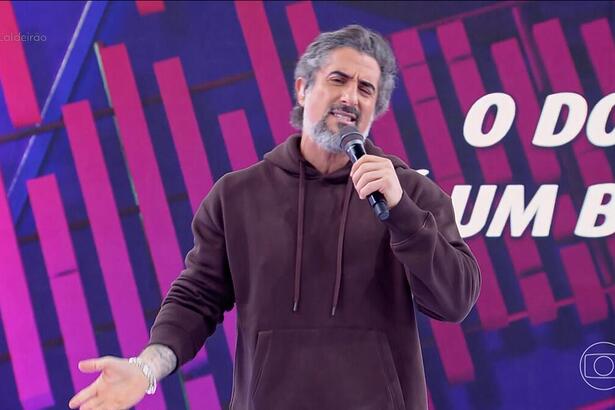 Marcos Mion com semblante triste apresentando o Caldeirão com Mion