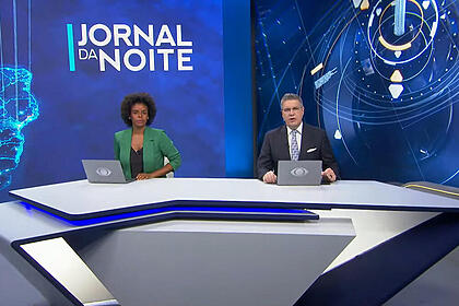 Cynthia Martins e Felipe Vieira na bancada do Jonal da Noite