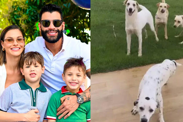 Andressa Suita e Gustavo Lima sorrindo abraçados com os filhos durante festa de aniversário; cachorros adotados por Gusttavo Lima e Andressa Suita