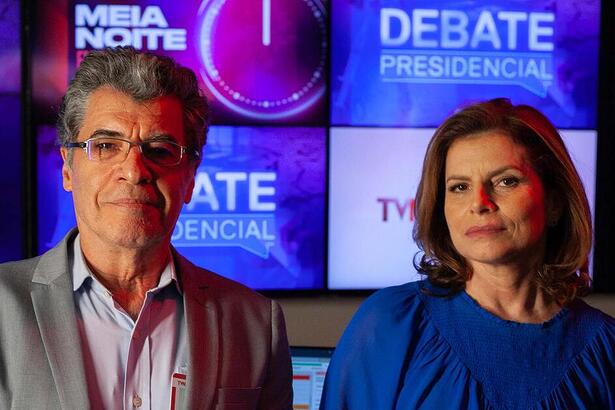 Debora Bloch e Paulo Betti em trecho do filme O Debate