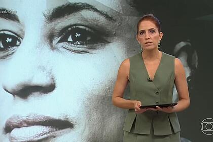 Poliana Abritta à frente do telão do Fantástico com imagem de Marielle ao fundo