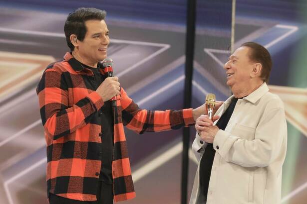 Celso Portiolli e Raul Gil no cenário do Programa Raul Gil