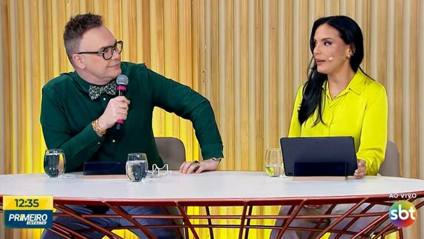 Felipeh Campos e Márcia Dantas sendo na bancadas do Primeiro Impacto