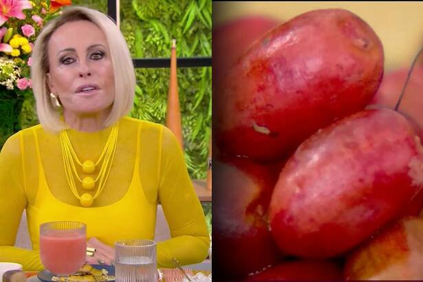 Ana Maria Braga de amarelo sentada a mesa do Mais Você dividindo tela coma fruta do milagre que é vermelha e se parece com uma acerola