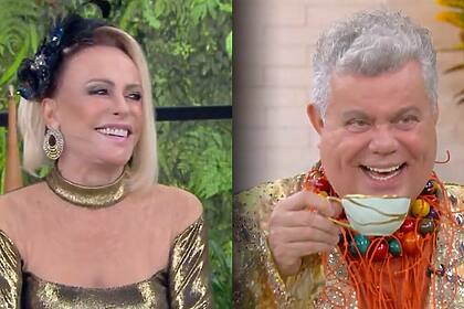 Ana Maria Braga de vestido brilhoso sorrindo olhando para o Milton Cunha segura xícara e sorrir