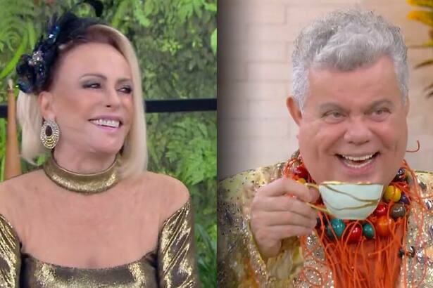 Ana Maria Braga de vestido brilhoso sorrindo olhando para o Milton Cunha segura xícara e sorrir