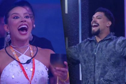 Renata com a boca aberta recebe Vinicius que vem cantando no palco da festa do Líder do BBB 25