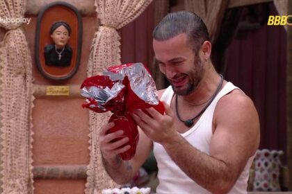 Diego hypolito segurando um ovo de páscoa em mãos no bbb 25
