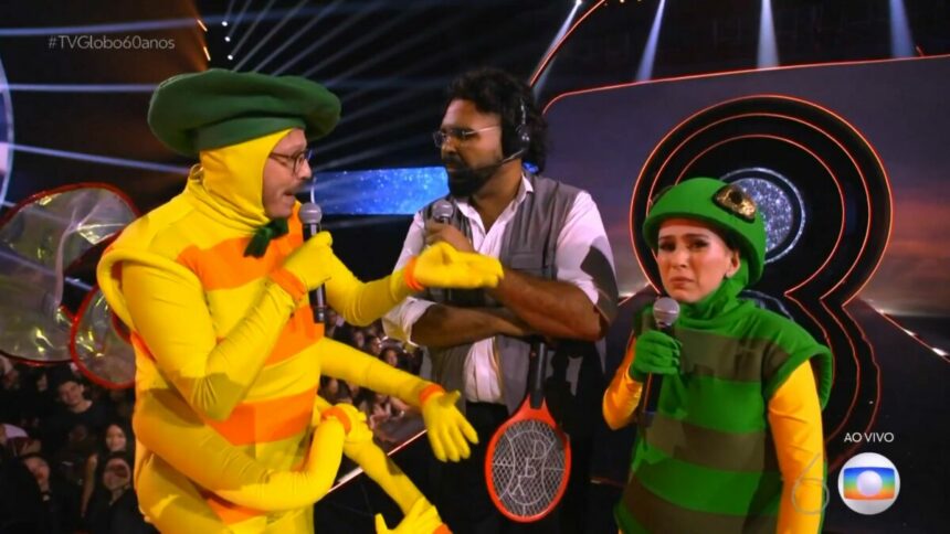 Tatá Werneck, Paulo Vieira e Fabio Porchat em trecho do show de 60 anos da TV Globo