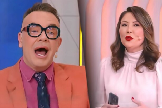 Felipeh Campos de terno laranja com a boca aberta discutindo com a delegada Raquel Gallinati que está em pé no cenário do Alô, Você