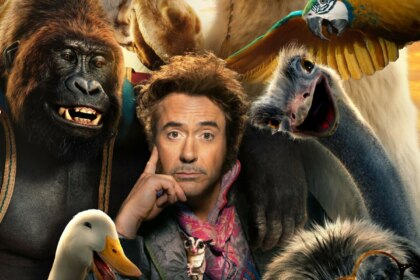 Robert Downey Jr. cercado por animais no pôster do filme Dolittle