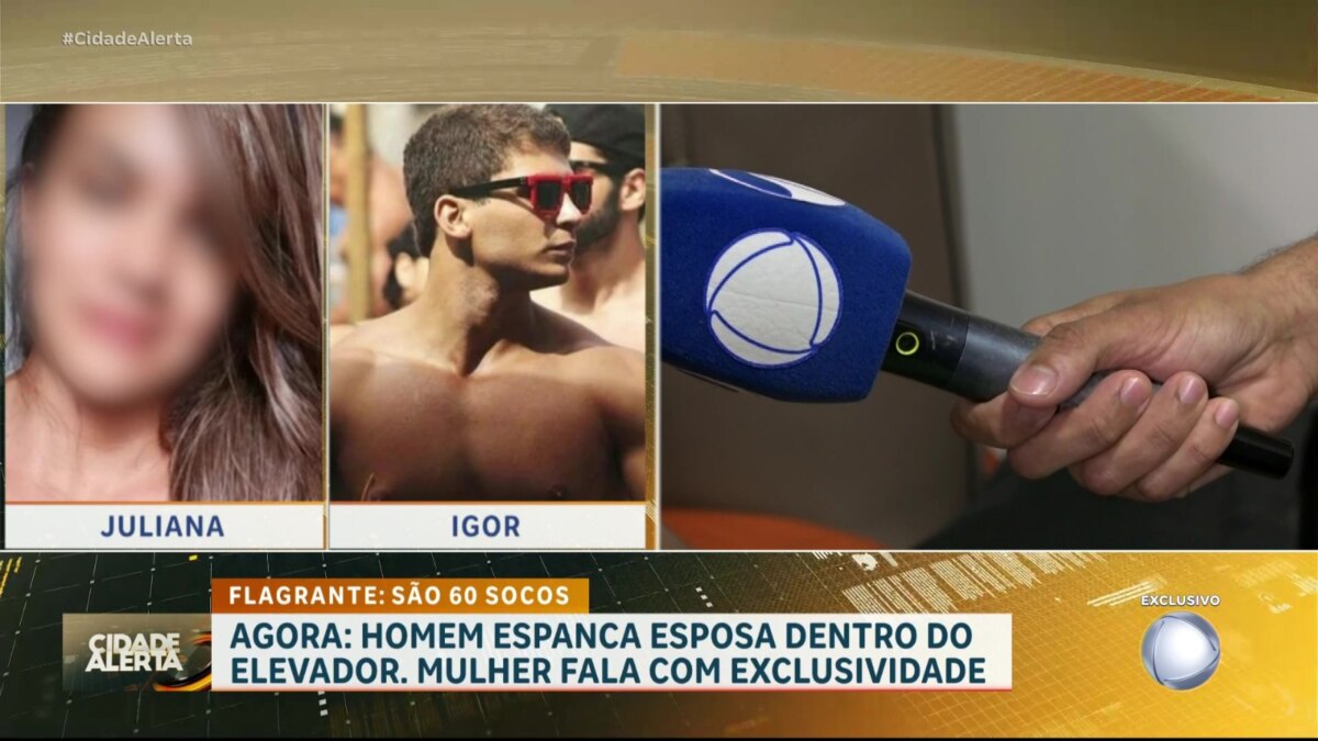 Microfone da TV Tropical, afiliada da RECORD, entrevistando mulher no Cidade Alerta com exclusividade