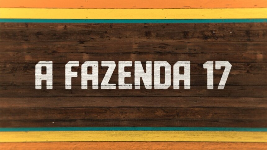Logo oficial da 17ª temporada de A Fazenda, com fundo de madeira escura e faixas coloridas em laranja, amarelo e verde, destacando o nome “A FAZENDA 17” em letras brancas e em relevo