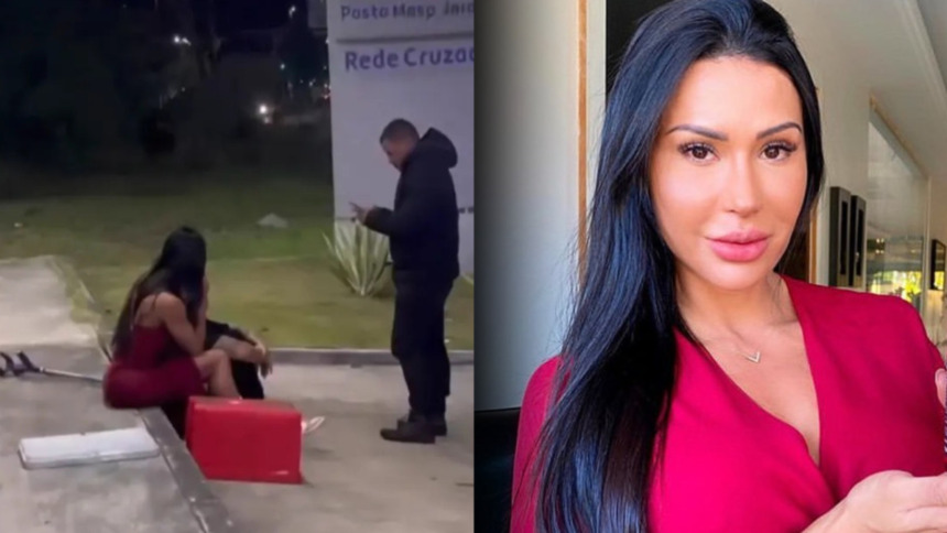 Gracyanne Barbosa sentada na calçada de uma rua sendo atendida por um policial após assalto no Rio de Janeiro