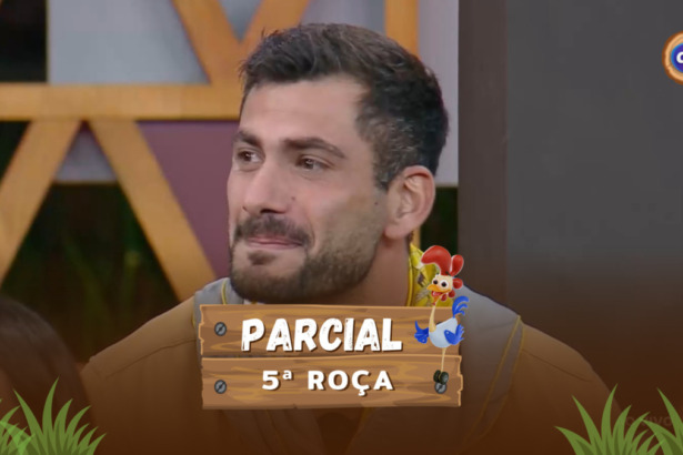 Nizam sorrindo na arte da enquete da 5ª Roça de A Fazenda 17