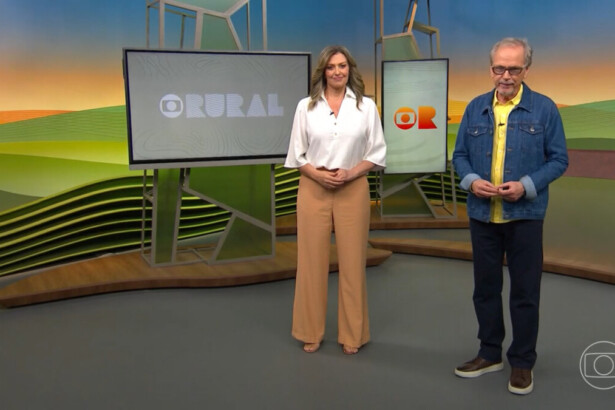 Cristina Vieira e Nélson Araújo no centro do cenário do Globo Rural. Ela vest conjunto claro e ele uma jaqueta azul com camisa amarela por dentro