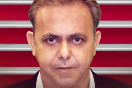 Repórter Águia Dourada com olhar sério nos bastidores da TV Cidade/RECORD