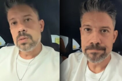 Jornalista Phelipe Siani em vídeo selfie dentro do carro, com expressão séria, relatando o assalto e a quebra do vidro do veículo