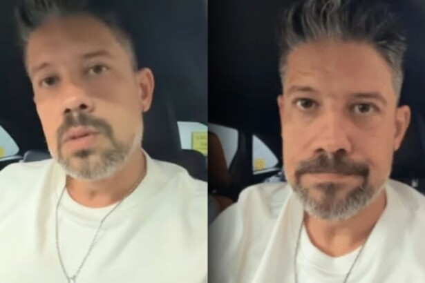 Jornalista Phelipe Siani em vídeo selfie dentro do carro, com expressão séria, relatando o assalto e a quebra do vidro do veículo