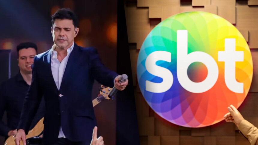 Zezé Di Camargo cantando no palco do especial de fim de ano do SBT divide tela com o logo da emissora
