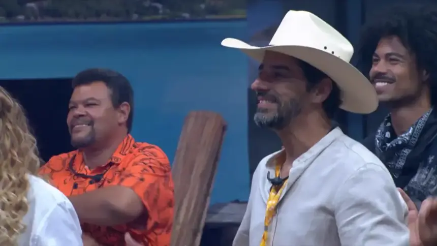 Alberto Cowboy emocionado no centro do palco de sua festa do líder no BBB 26