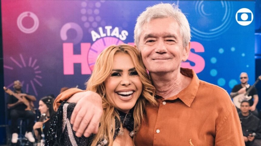 Joelma e Serginho Groisman abraçados em foto posada nos bastidores de edição do Altas Horas