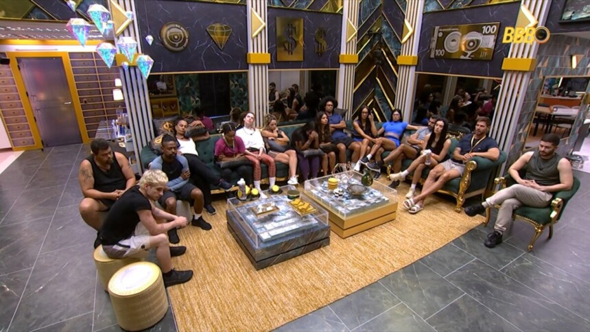 Elenco do BBB 26 sentado no sofá da sala ouvindo esporro de Tadeu Schmidt