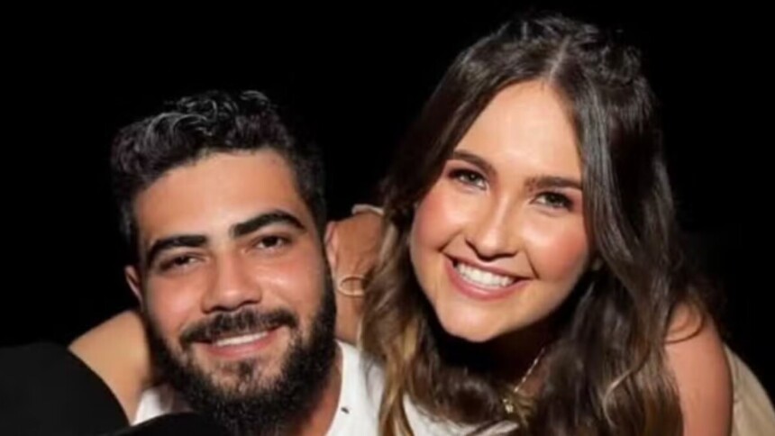 Henrique e a esposa Amanda em foto posada abraçados
