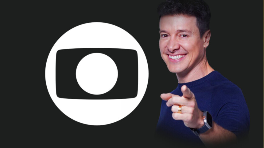 Rodrigo Faro aponta para a tela ao lado do logo da Globo em preto e Branco