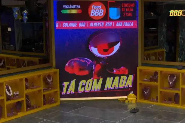 Logo do Tá Com Nada no telão da sala do BBB 26