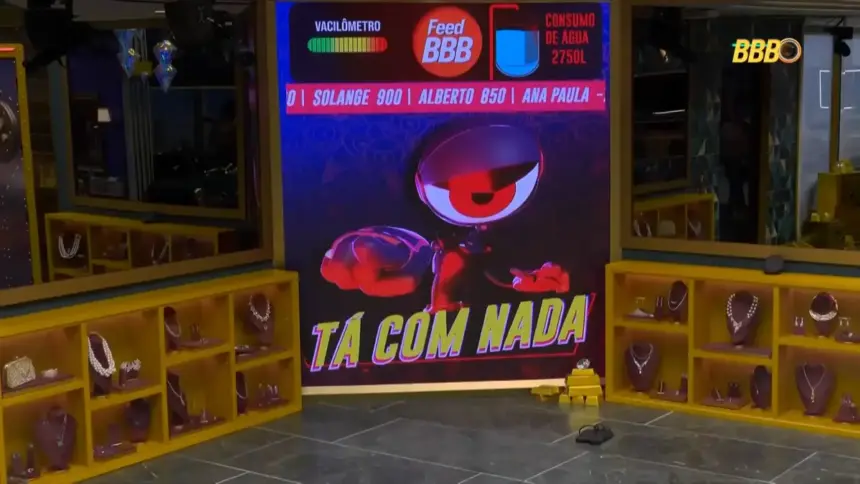 Logo do Tá Com Nada no telão da sala do BBB 26