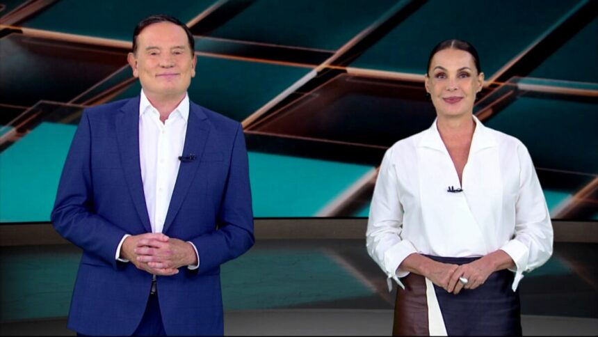 Cabrini e Carolina no cenário do Domingo Espetacular