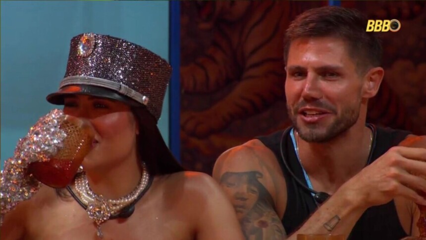 Jordana e Jonas tomando bebida e conversando na festa do líder no BBB 26
