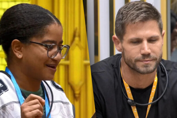 Milena divide tela com Jonas na sala do BBB 26. Ela sorrir e o coloca no Monstro, enquanto ele olha pra baixo
