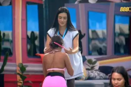 Jordana coloca cordão vermelho do monstro no pescoço de Gabriela no gramado do BBB 26