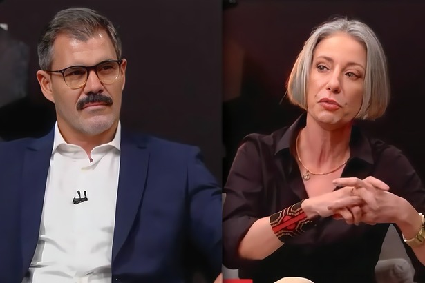 Juliano Cazarré olha sério para Vera Iaconelli. Os dois estão sentados lado a lado no estúdio do GloboNews Debate